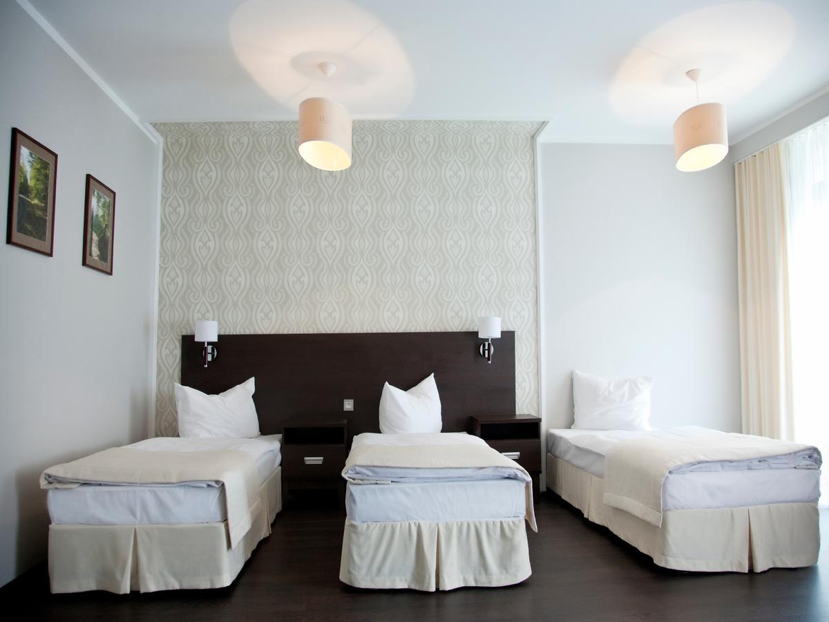 Hotel Grzegorzewski Тушен Стая снимка