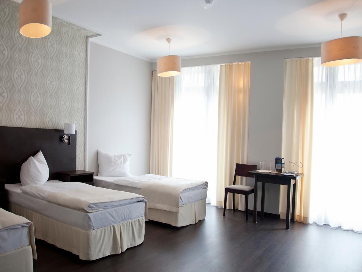 Hotel Grzegorzewski Тушен Стая снимка