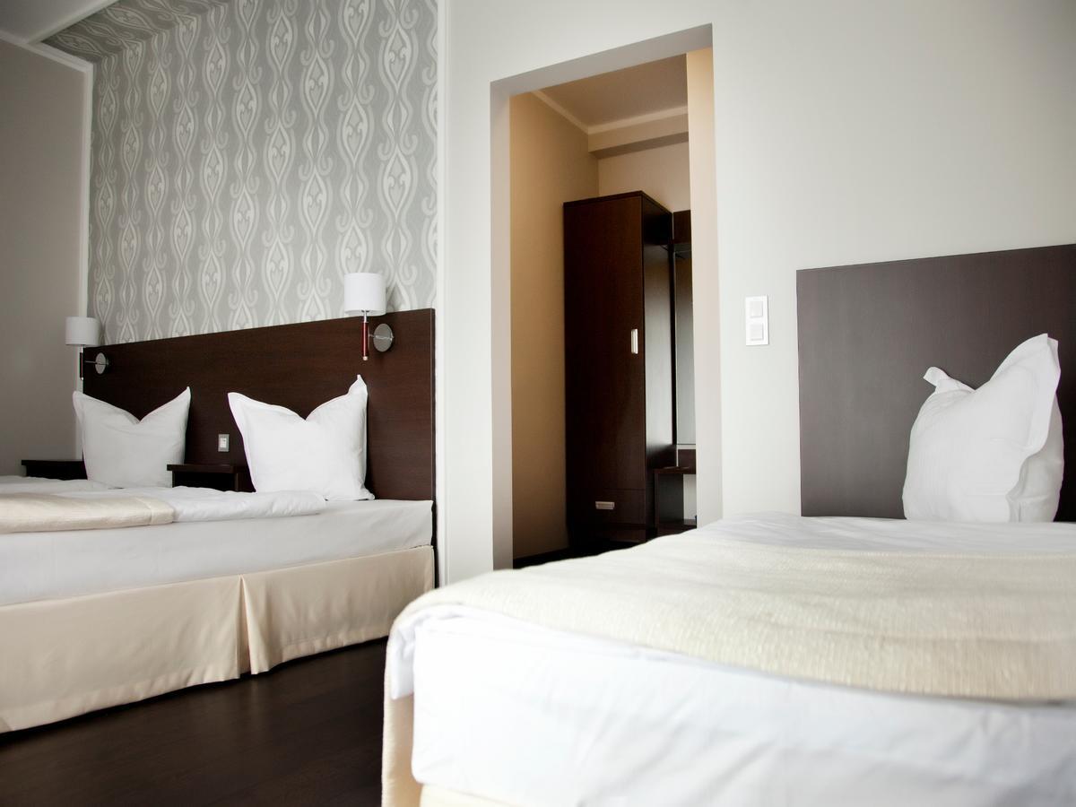 Hotel Grzegorzewski Тушен Стая снимка
