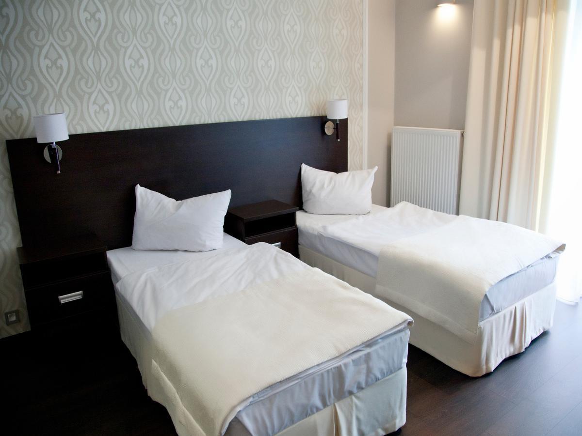 Hotel Grzegorzewski Тушен Стая снимка